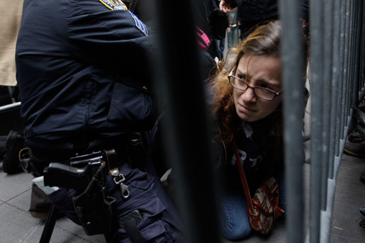 En demonstrant arresteras efter att ha blockerat entrén till New York-börsen på torsdagen.