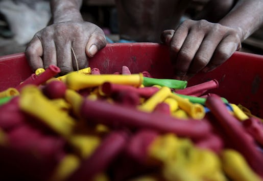 In this Wednesday, Sept. 26, 2012 photo, a Bangladeshi child laborer works at a balloon factory in Dhaka, Bangladesh. Bangladesh adopted the National Child Labor Elimination Policy 2010, providing a framework to eradicate all forms of child labor by 2015, but according to the International Labour Organisation there are about 3.2 million child laborers in Bangladesh. (AP Photo/A.M Ahad)
