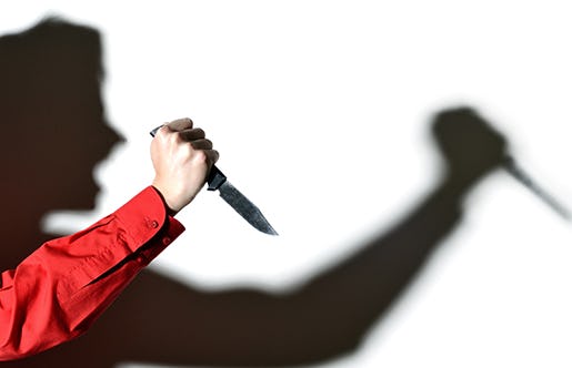 violence - a hand with a knife