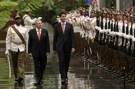 Cuba's President Raul Castro, left, and Canada Prime Minister Justin Trudeau, review troops during a welcoming ceremony at Revolution Palace in Havana, Cuba, Tuesday, Nov. 15, 2016. Trudeau is on a two-day official visit to Cuba .(Enrique de la Osa/Pool via AP)