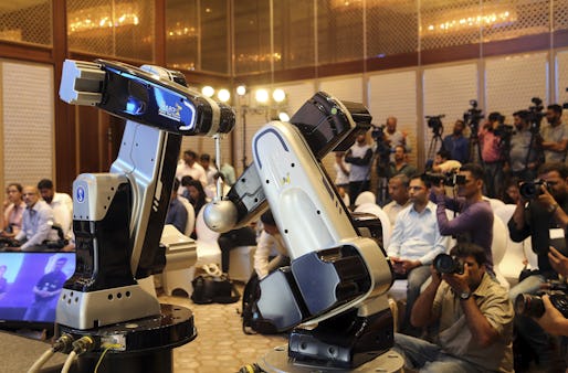 TAL Brabo robot is displayed during a press conference in Mumbai, India, Tuesday, April 11, 2017. TAL Manufacturing Solutions, a subsidiary of Tata Motors Ltd. on Tuesday launched two variants of the TAL Brabo, which they claimed was IndiaÄôs first industrial- articulated robot. (AP Photo/Rajanish Kakade)