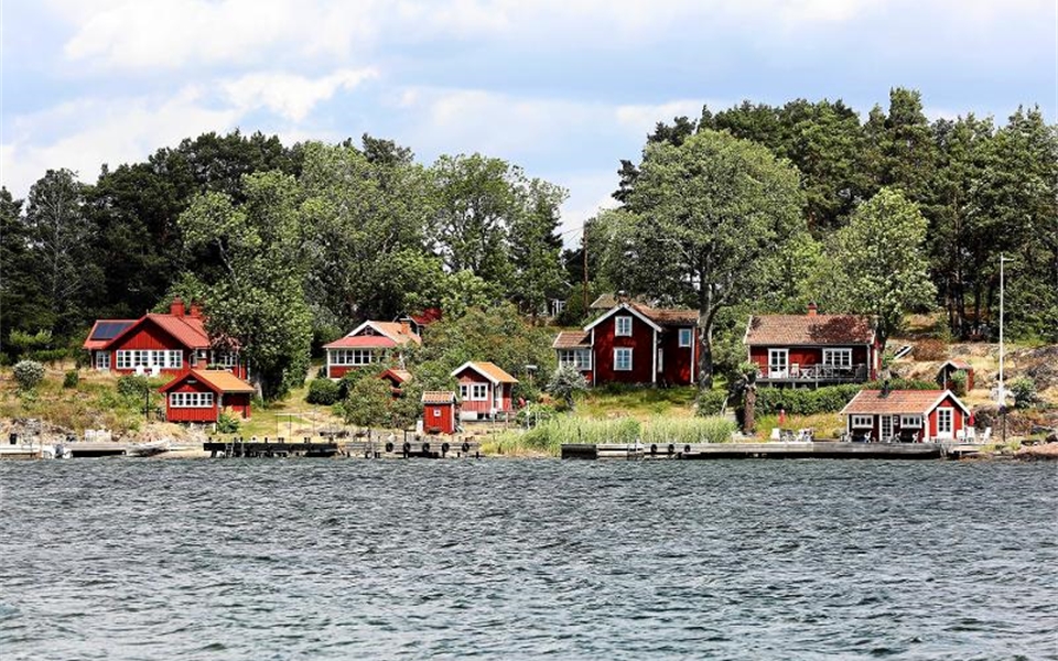 Hus vid en strand