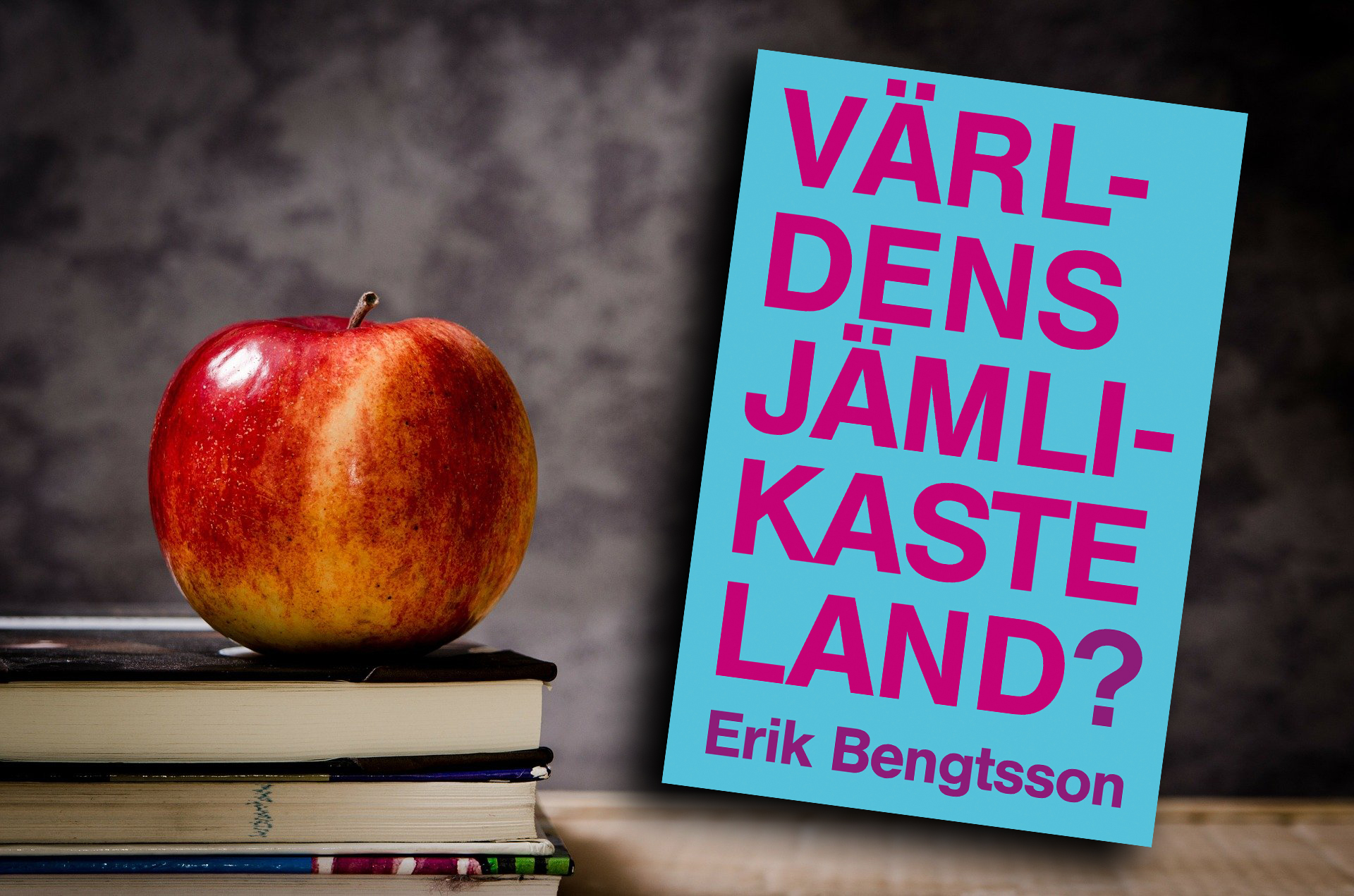 Ett äpple som liggen på en trave böcker, med omslaget till boken "Världens jämlikaste land?" monterat över.