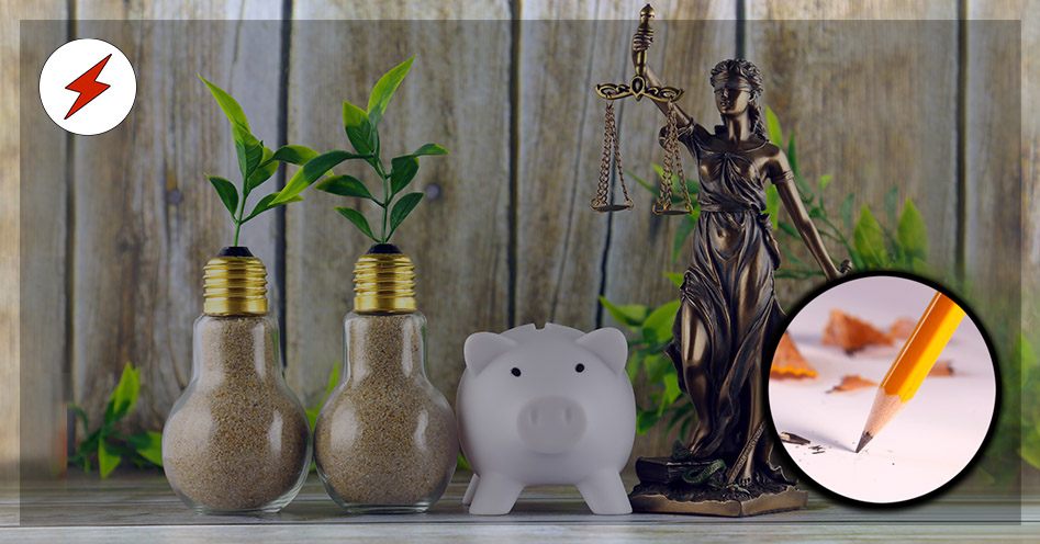 Två glödlampor fyllda med sand, som det växer blad ur, en spargris och en staty av rättvisans gudinna med våg och svärd