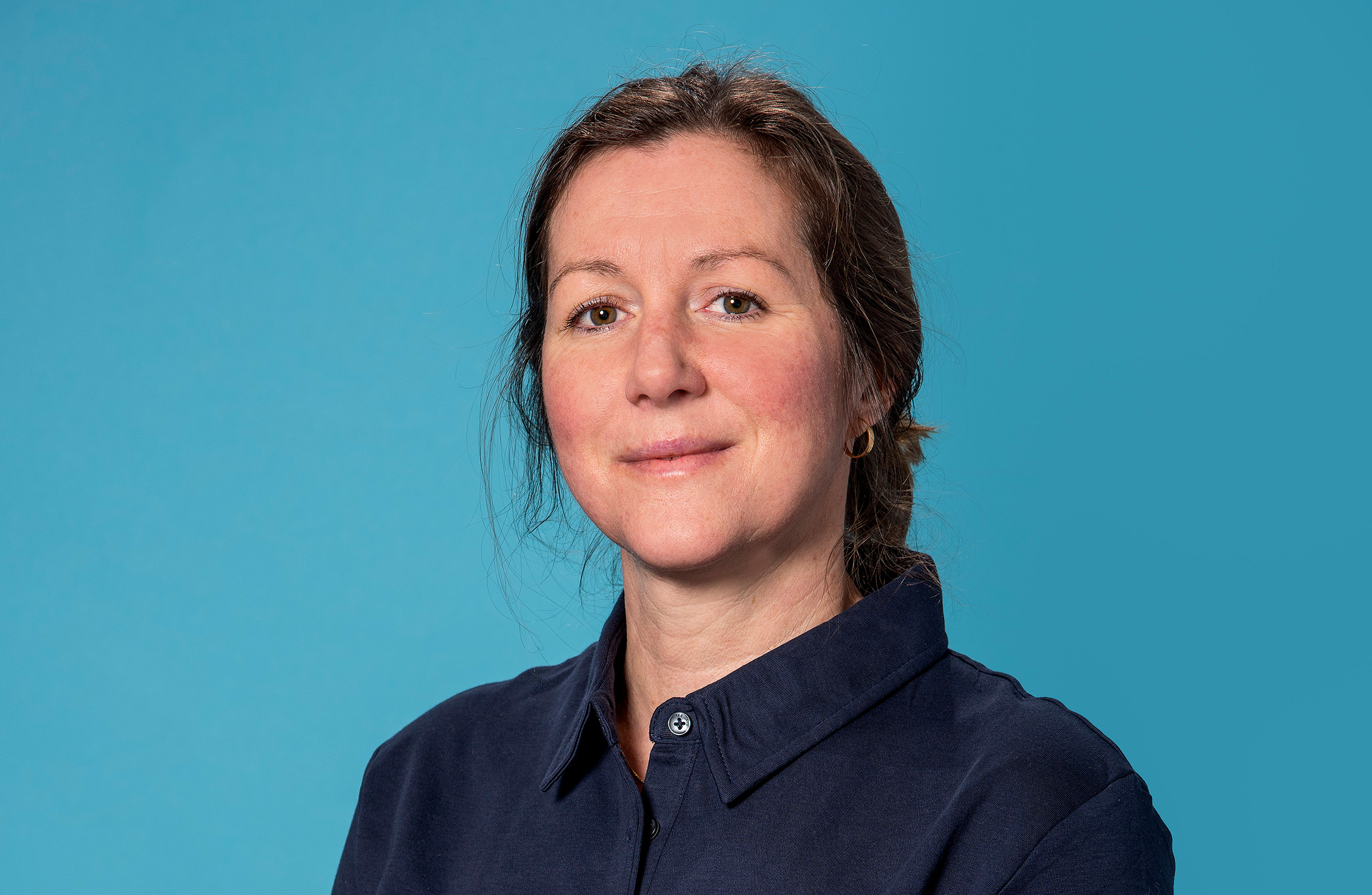 Fastighetsskötaren Sandra Bergström i Mjölby i sina arbetskläder.