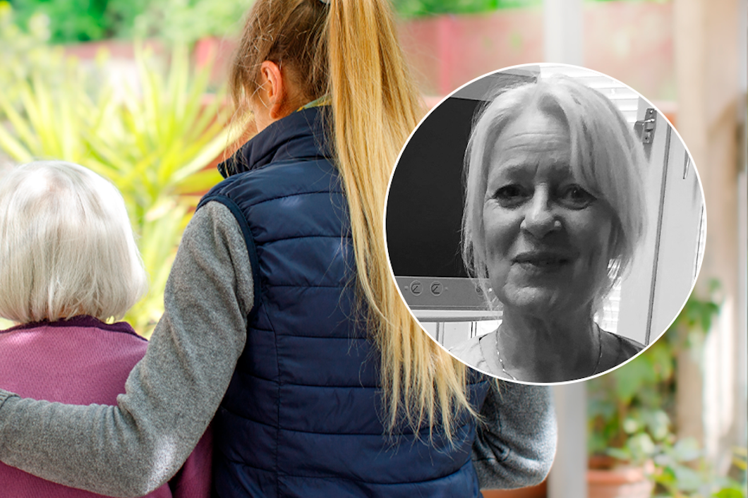 En kvinna som jobbar inom vården som håller om en äldre person om ryggen.
