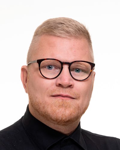 Porträtt på Tom Hansen.
