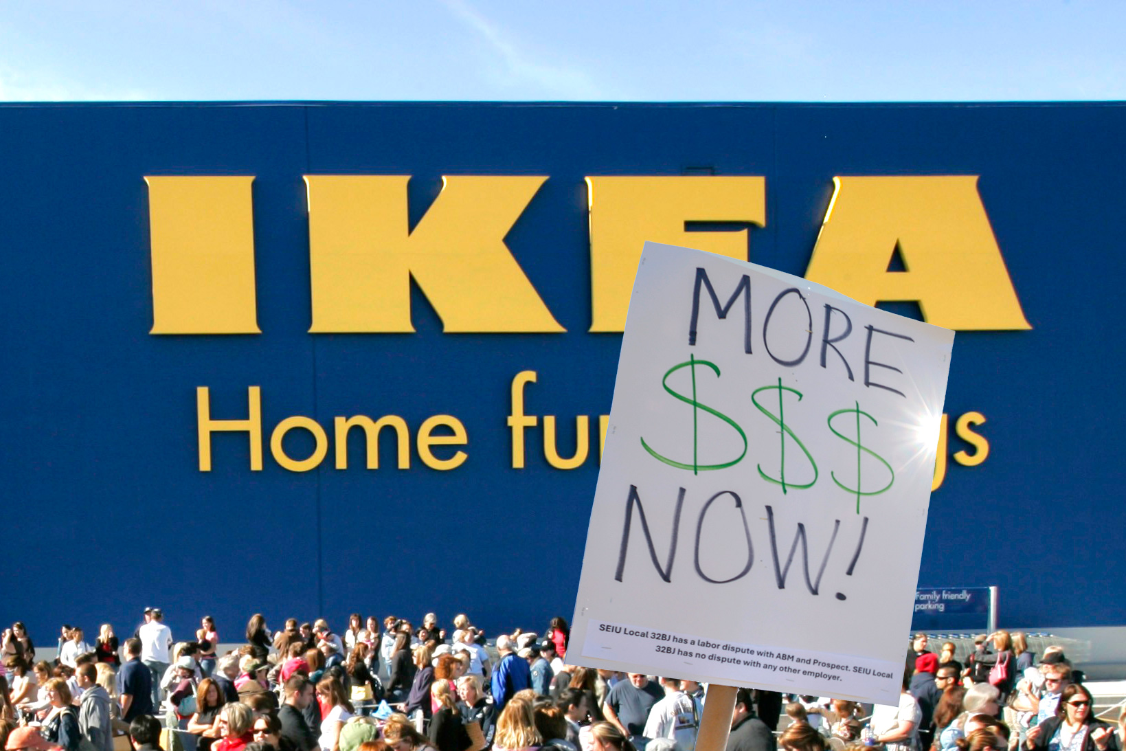 En folkmassa har samlats utanför en IKEA-butik, där en person håller ett stort plakat med texten "MORE $$$ NOW!".