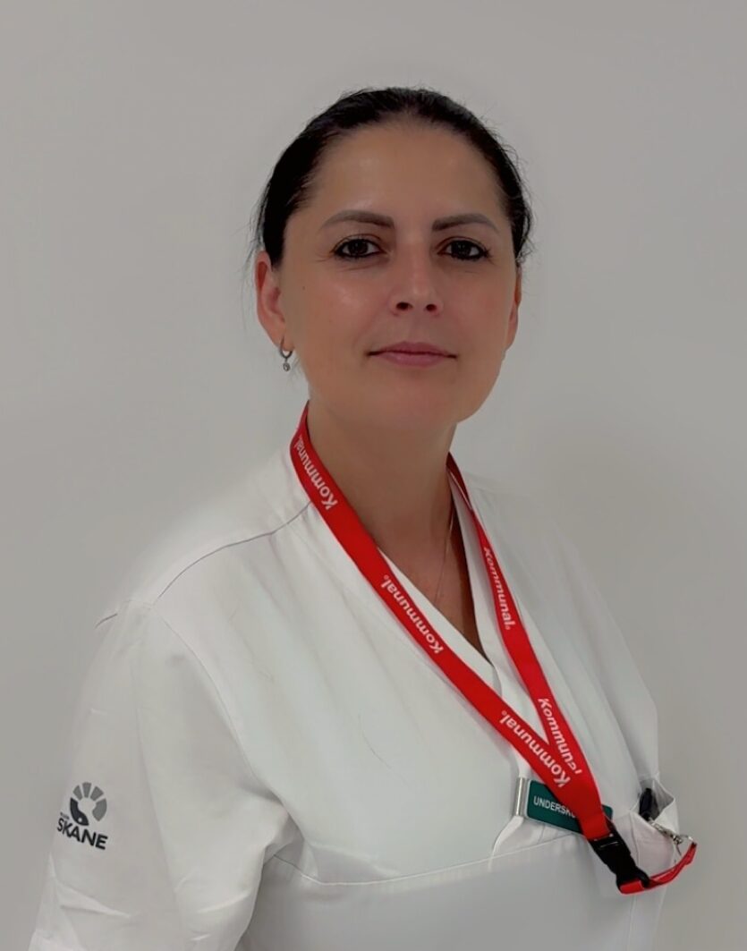 Zyrafete Ramosaj i arbetskläder