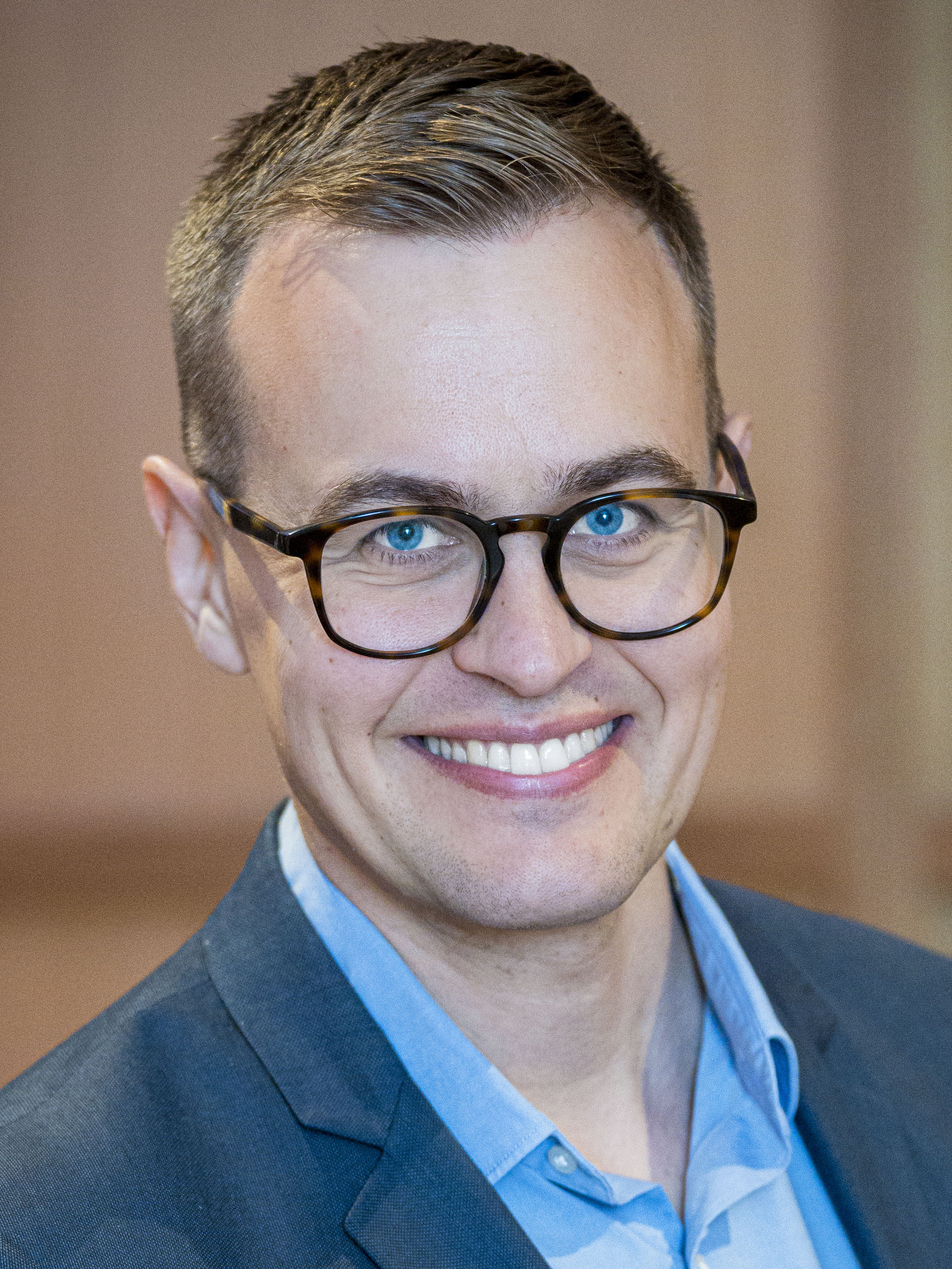 Porträtt på Joacim Tåg, forskare.