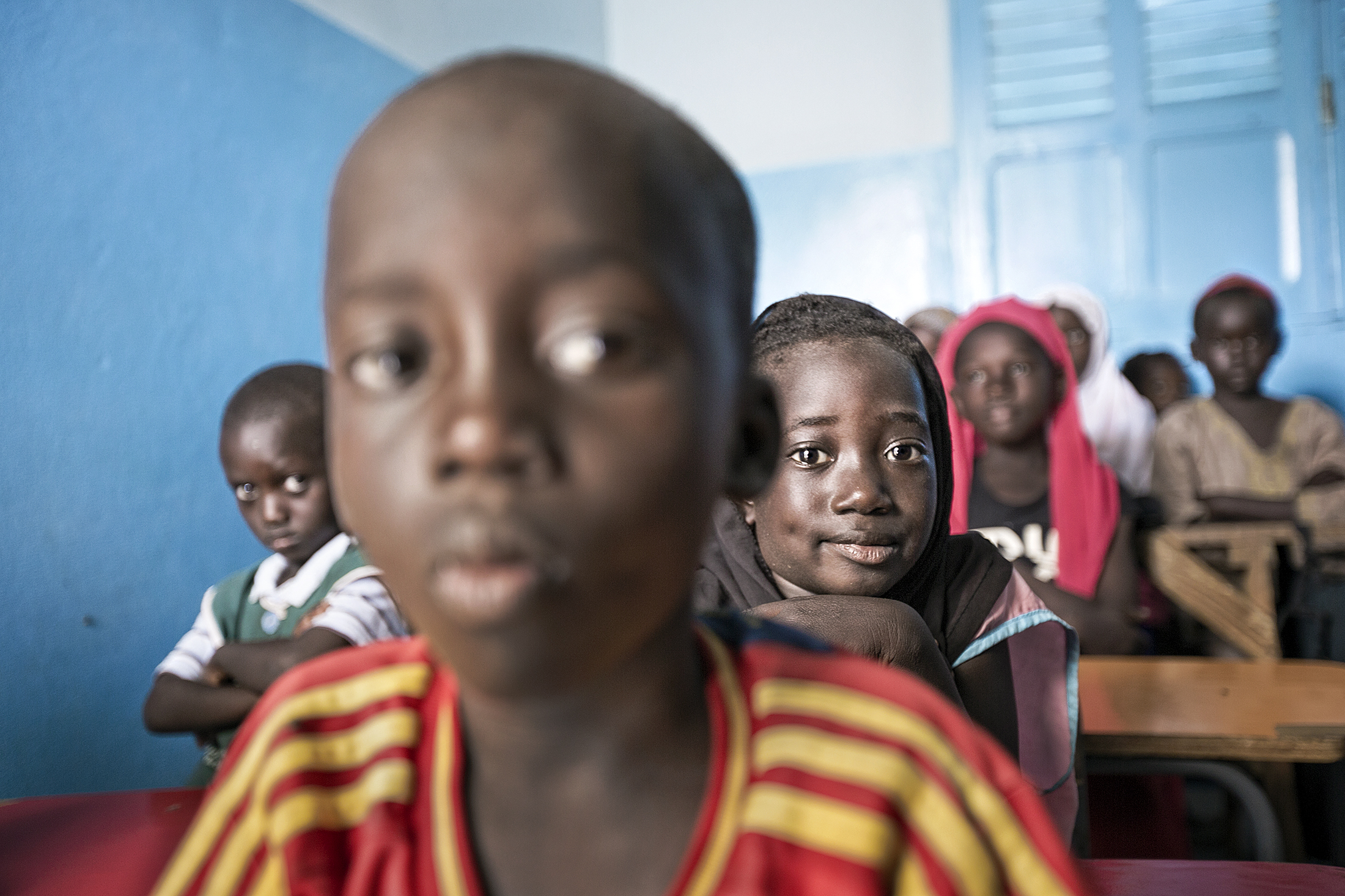 Fiskrökerskorna i Thiraoye startade skola på sitt område.