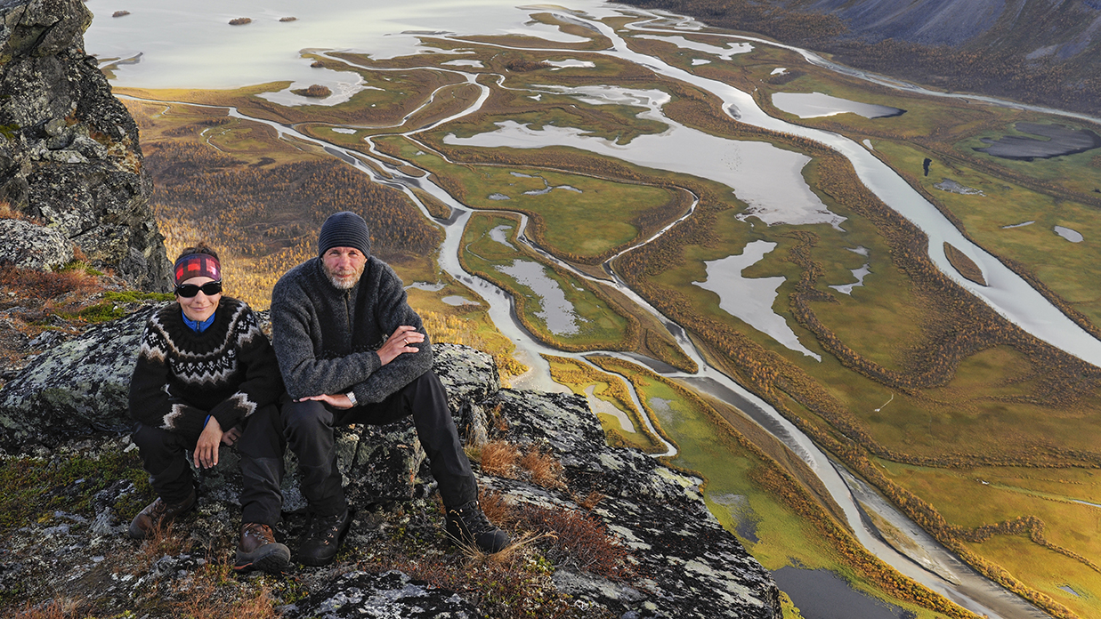 Erlend Haarberg and Orsolya Haarberg, with the Laitaure delta in the background. Sarek National Park, World Heritage Laponia, Swedish Lapland, Sweden.