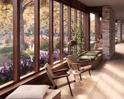 Mysigt solrum med designelement i trä, bekväma sittplatser och utsikt över en trädgård.