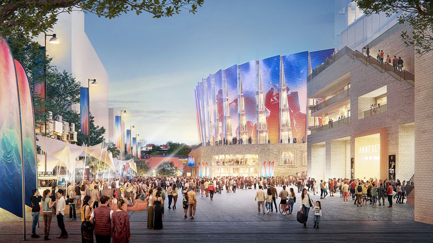 Visualisering av stor folkmassa samlas på ett torg utanför en arena med höga, blå inslag vid skymning.